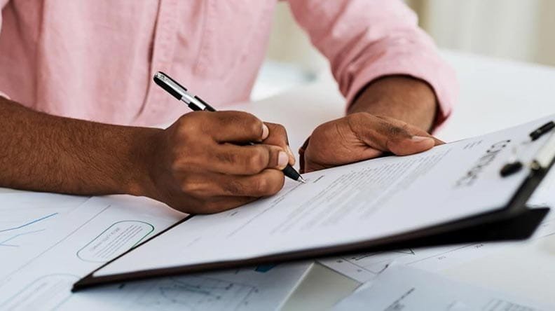 person filling out form